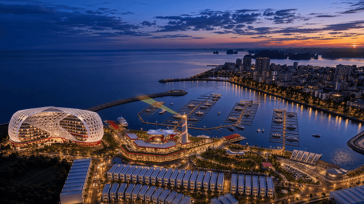 Modern coastal cityscape at dusk, with a distinctive building, marina, and city lights.