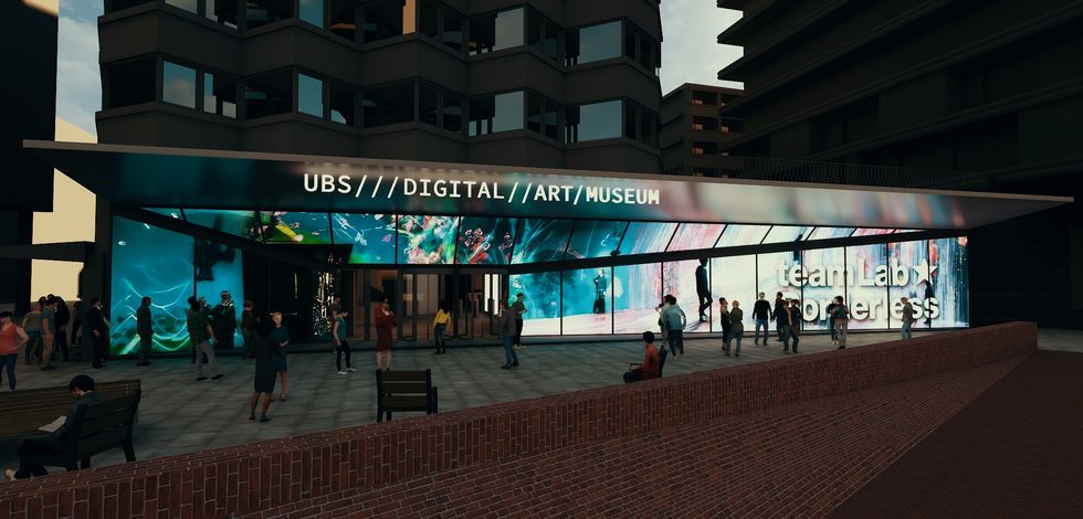 Modern digital art museum entrance with colorful displays, people gathered outside.