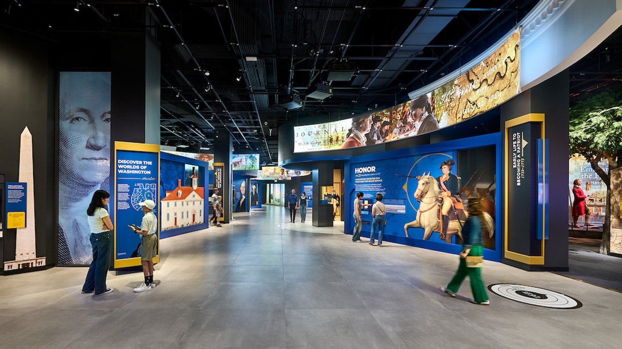 Modern museum exhibit with interactive displays and historical panels about Washington.