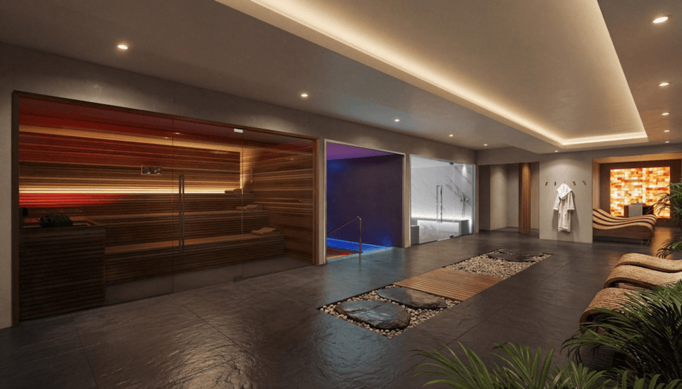 Modern spa interior with sauna, relaxing lounge chairs, and ambient lighting.