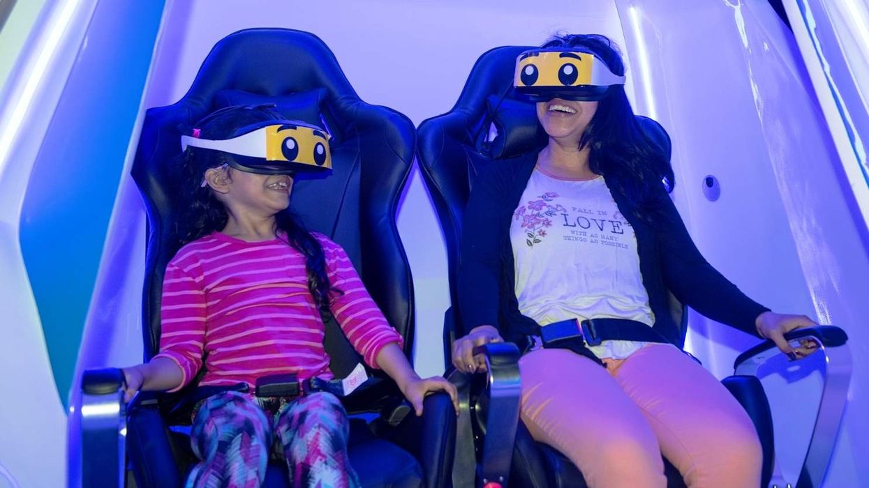 mother and child experience Immotion VR ride at Legoland Discovery Center Boston