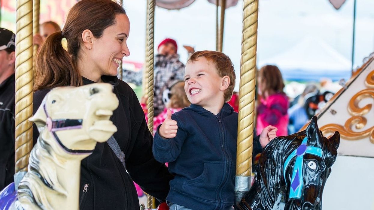 mother and child on carousel theme park investment adbobe copy 1 (1)