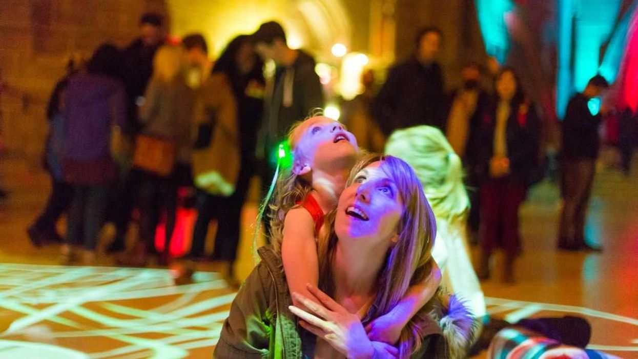Mother and Daughter appreciating light exhibition at Liverpool Light Night
