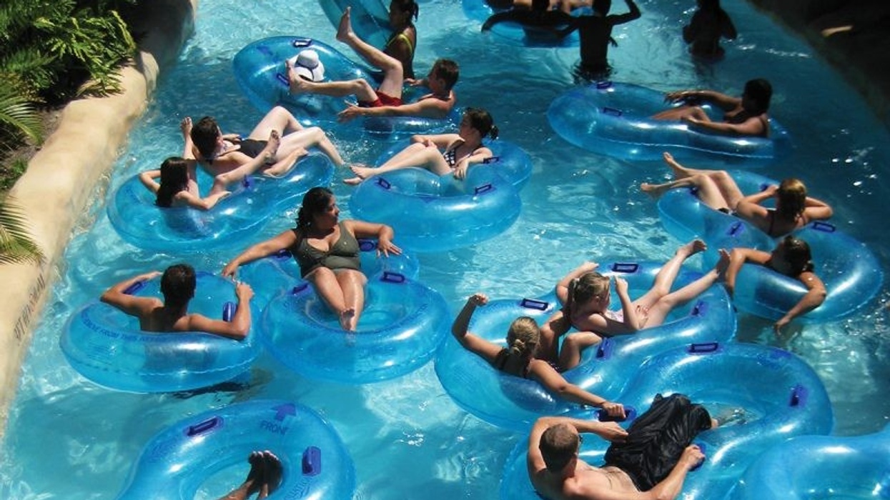 Multiple people on inflatable tubes in a lazy river