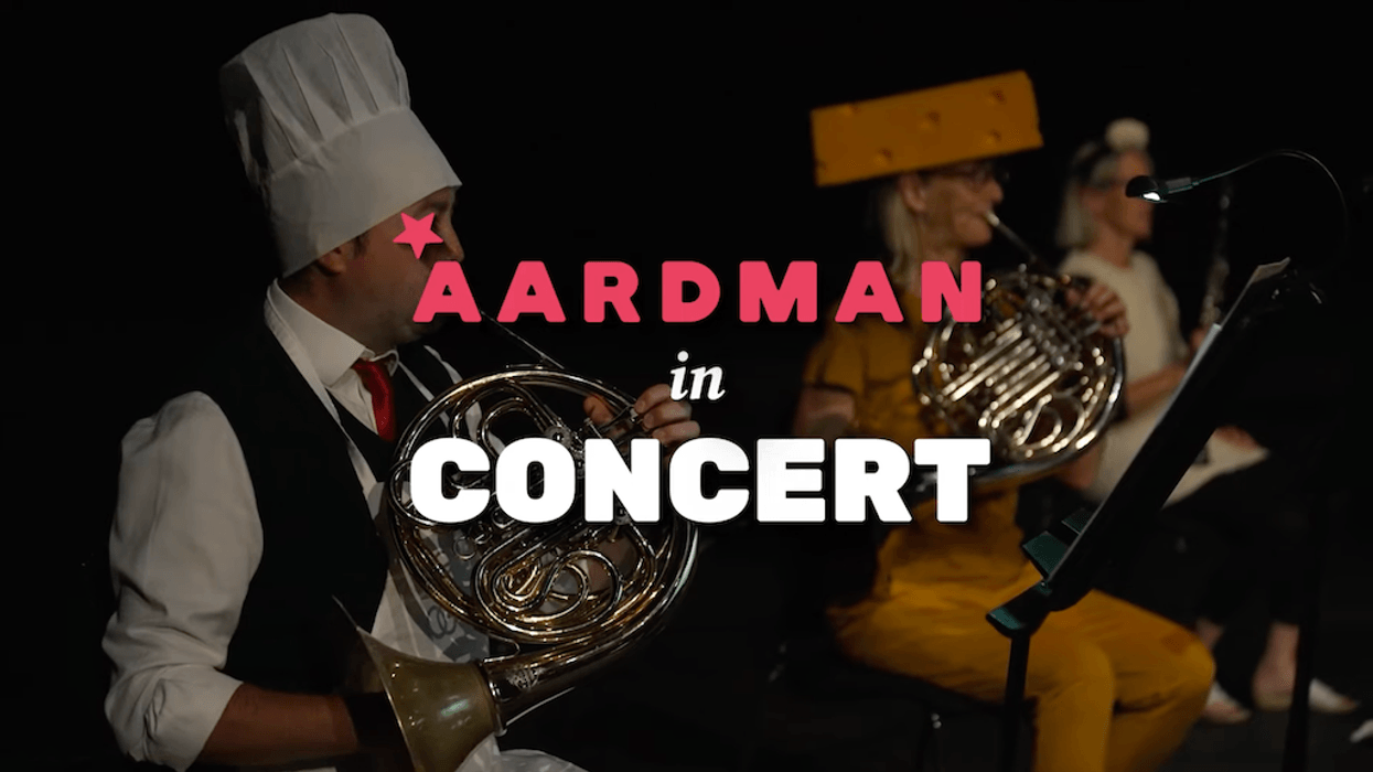Musicians in costumes playing horns, text reads "Aardman in Concert."