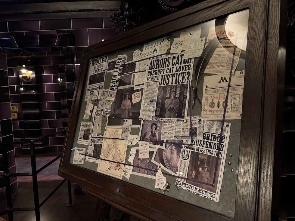 Newspaper clippings in Auror Office for Dolores Umbridge trial