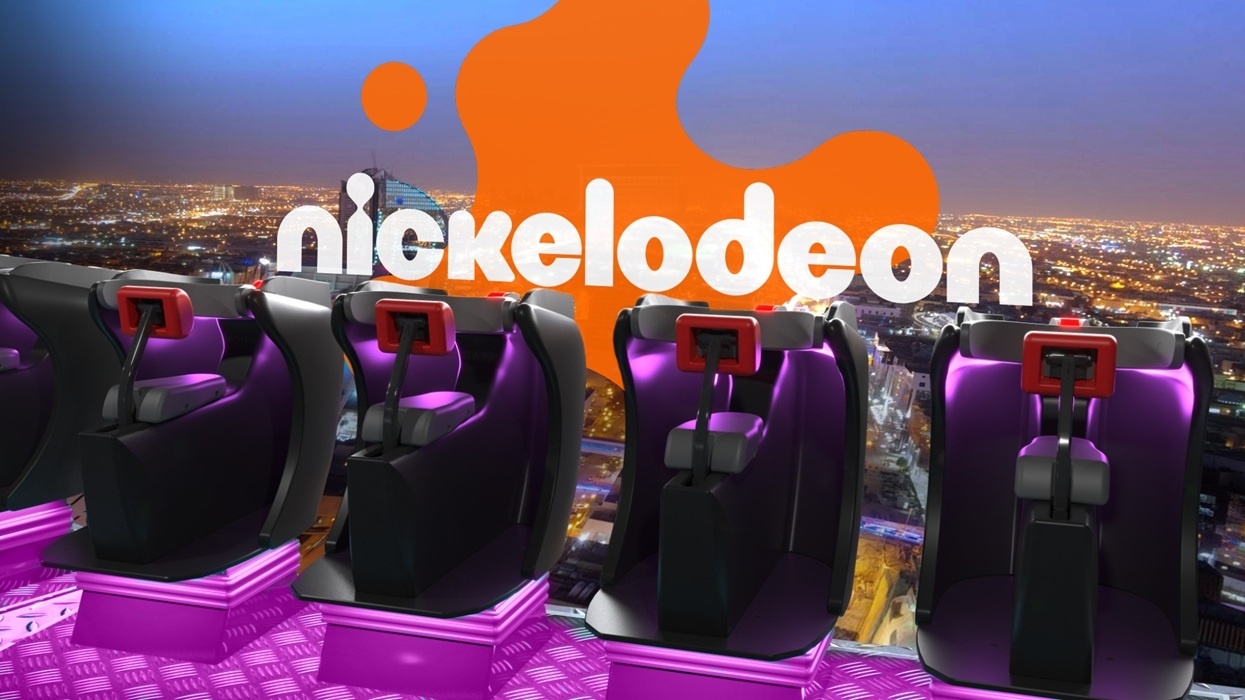 Nickelodeon logo with futuristic ride seats and cityscape background at dusk.