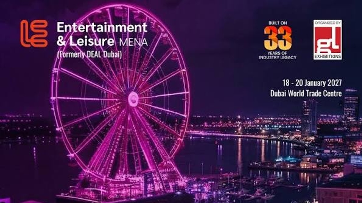Night view of a lit Ferris wheel and cityscape, promoting Entertainment & Leisure MENA.
