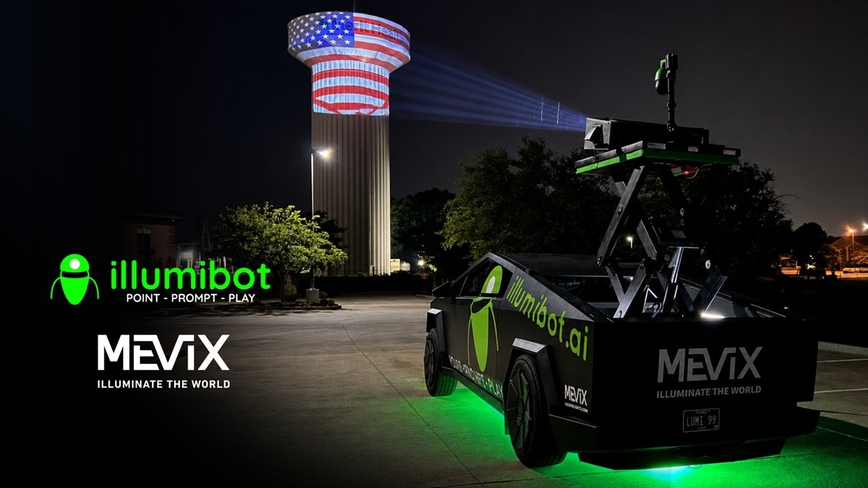 Nighttime projection on a tower from an IllumiBeast vehicle with green underglow lighting.