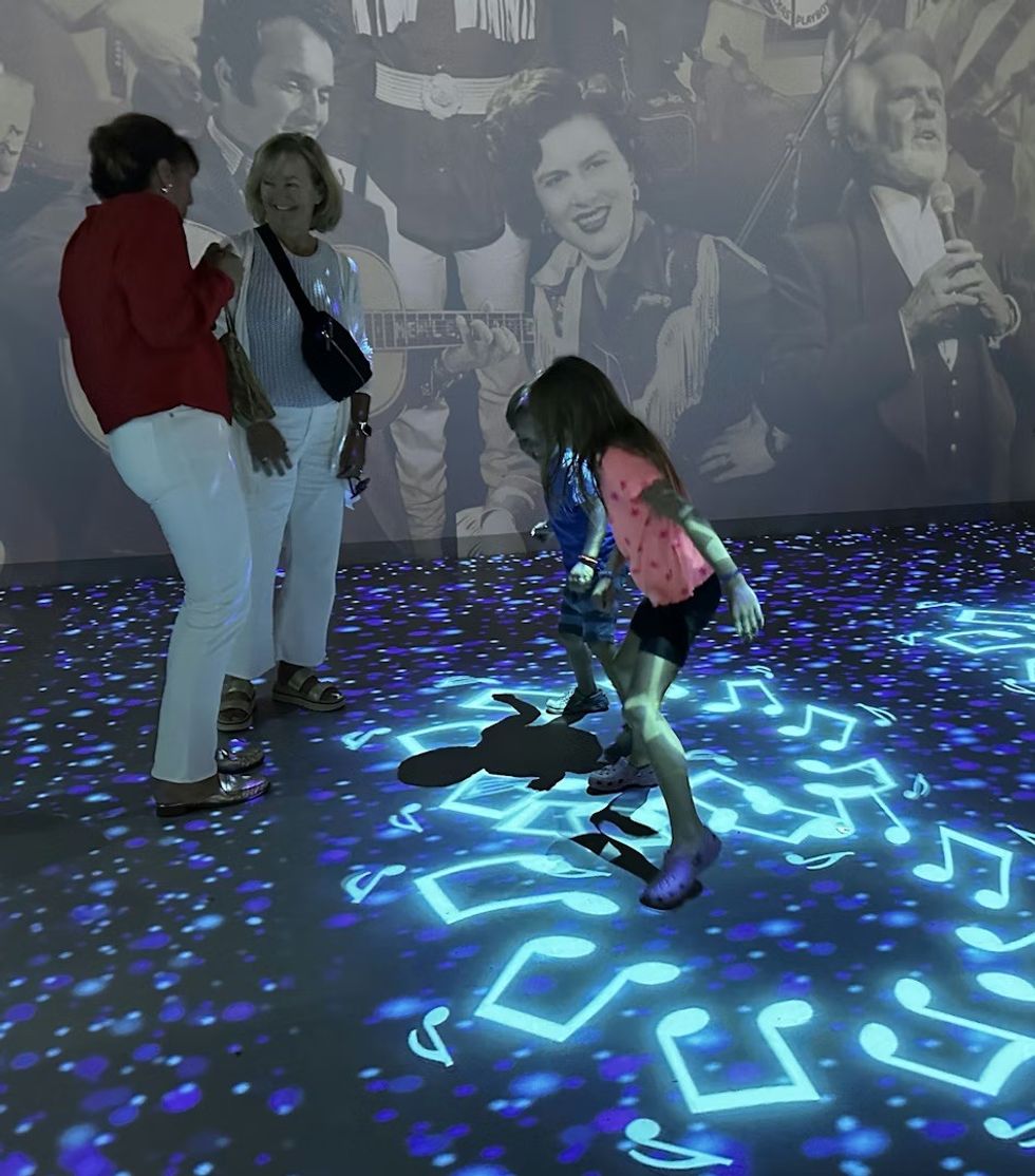 Not Fade Away at the Surf Ballroom Experience Center projection mapped floor
