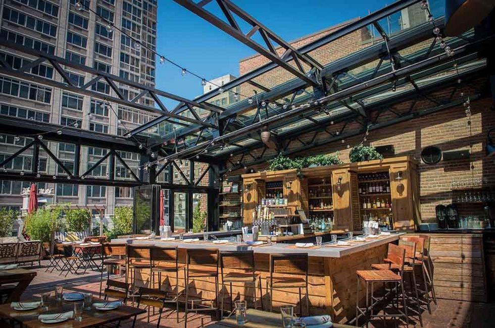 OpenAire award winning designer of retractable roof for Refinery Rooftop Bar