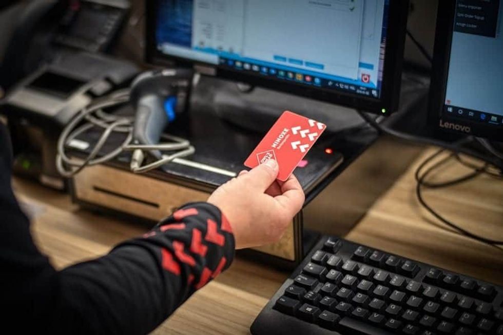 Owl's Head Ski Resort employee with Connect&GO's RFID card