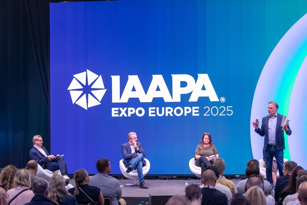 Panel discussion at IAAPA Expo Europe 2025 on stage with audience.