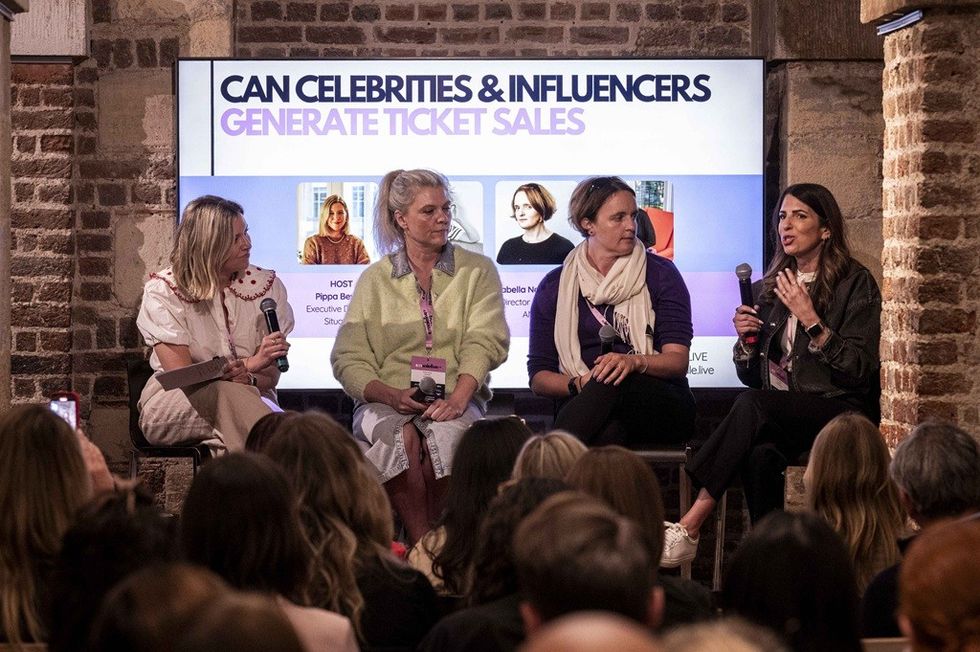 Panel discussion on influencer impact on ticket sales, with four speakers and an audience.