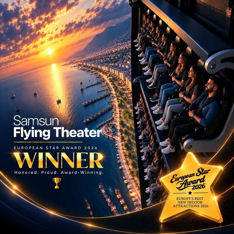 People enjoying a ride in Samsung Flying Theater at sunset, winner of European Star Award 2026.