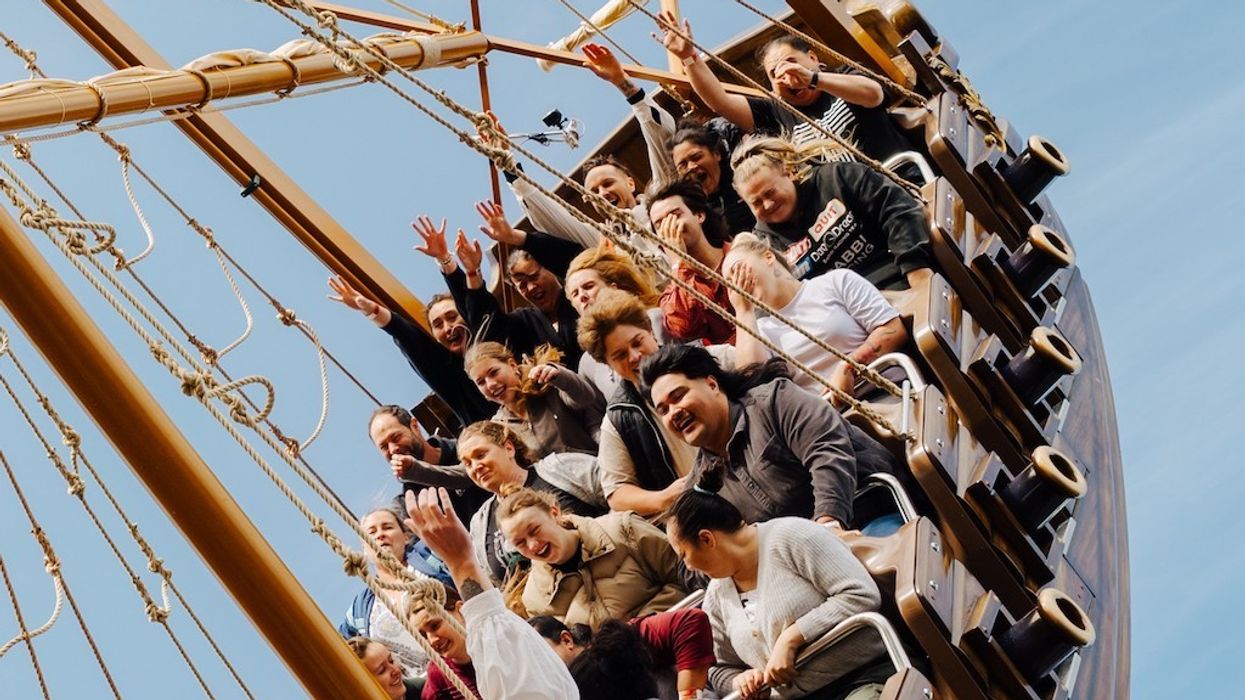 People enjoying Huss Pacifica swinging pirate ship ride at Rainbow's End