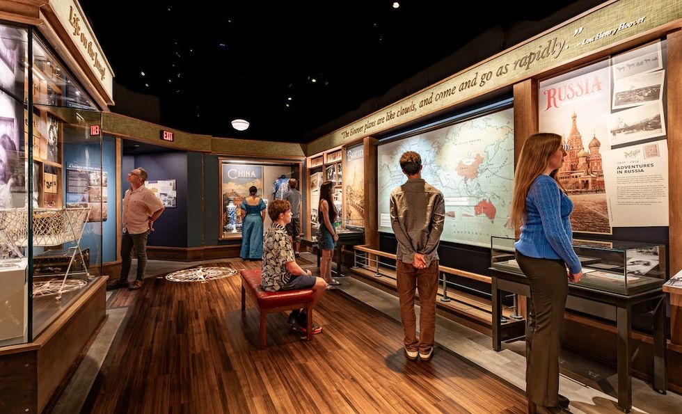 People exploring historical exhibits at Herbert Hoover Presidential Library and Museum