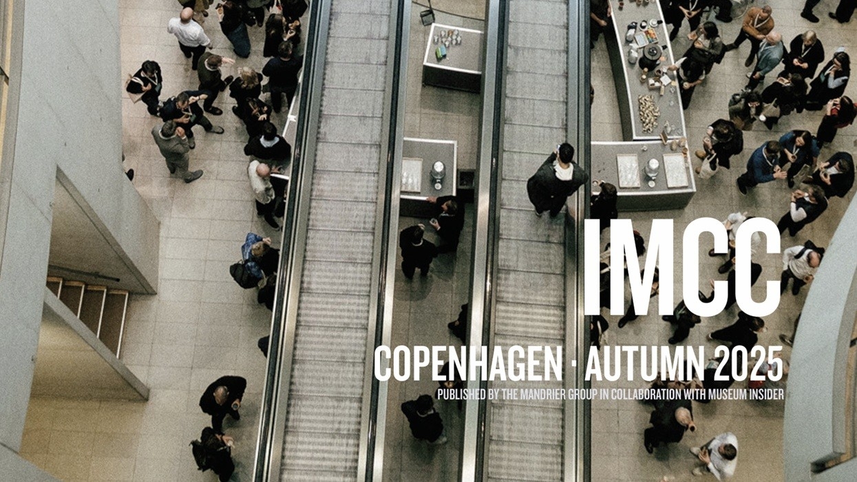 People gathered around escalators at IMCC Copenhagen, Autumn 2025 event.