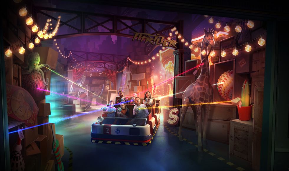 People in ride at Grona Lund shooting laser guns at carnival-themed targets, surrounded by colorful lights.