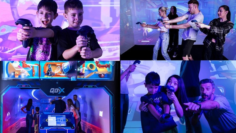 People playing a QBIX game in a colourful VR arcade.