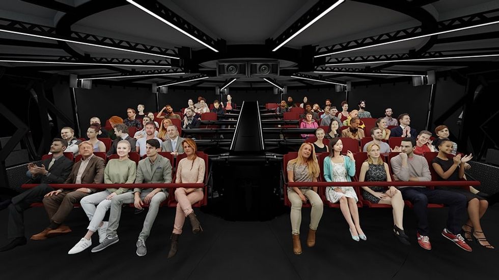 people sat in rows watching screen