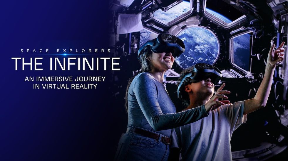 People wearing VR headsets in a space-themed virtual reality experience.