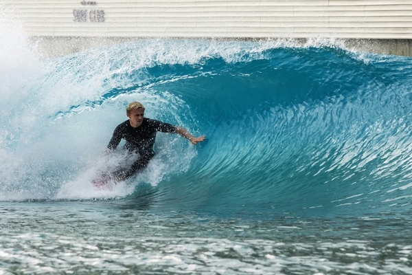 PerfectSwell Gen 6 surfer in a pipe wave