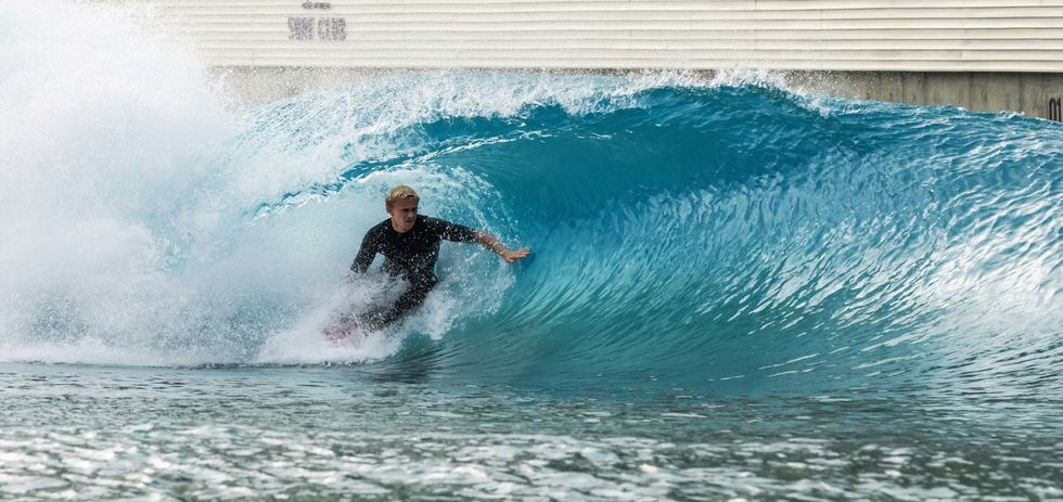 PerfectSwell Gen 6 surfer in a pipe wave