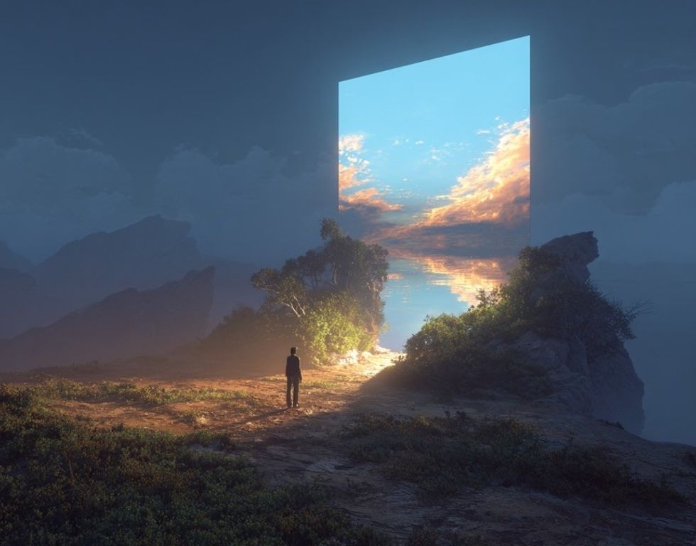 Person facing a large, glowing portal in a misty landscape.