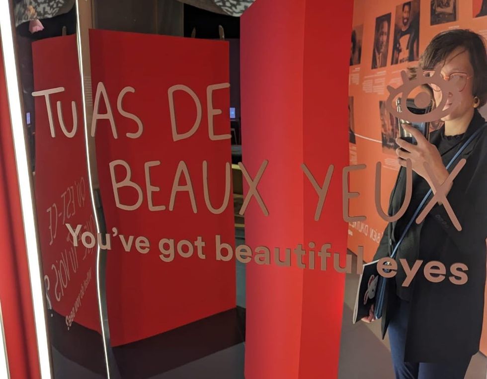 Person taking a selfie in a mirror, text reads \u201cYou\u2019ve got beautiful eyes.\u201d