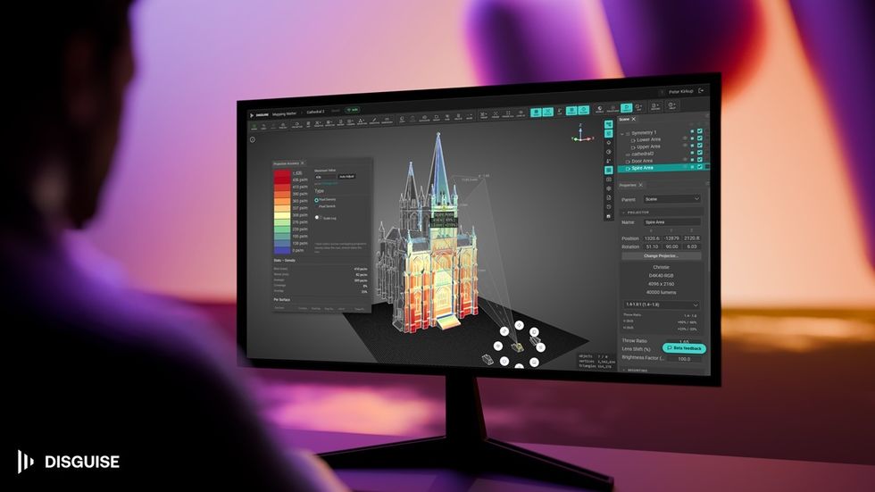 Person using Disguise Mapping Matter software on a monitor, showcasing a cathedral model.