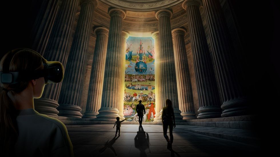 Person wearing VR headset in grand hall with columns, colorful artwork in the background.