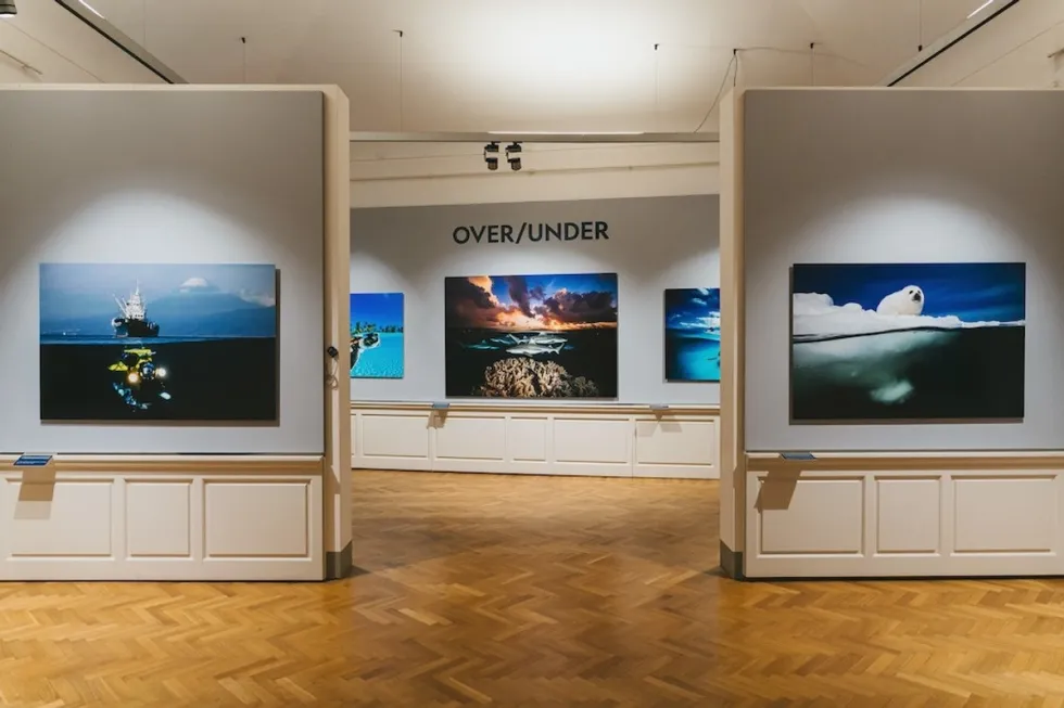 Photography exhibit Oceans featuring ocean-themed photography on display.
