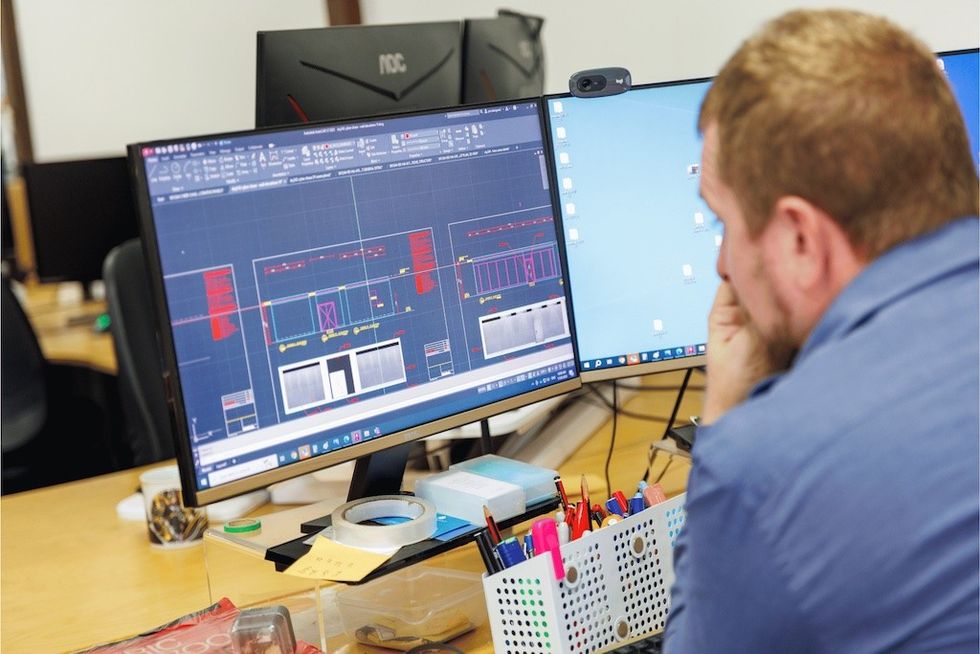 Pico-Play-designer-at-computer-screen