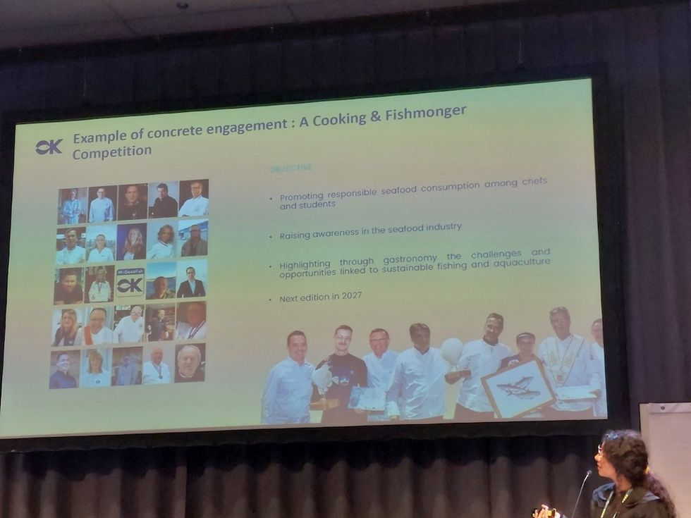 Presentation slide about a cooking and fishmonger competition with objectives listed.