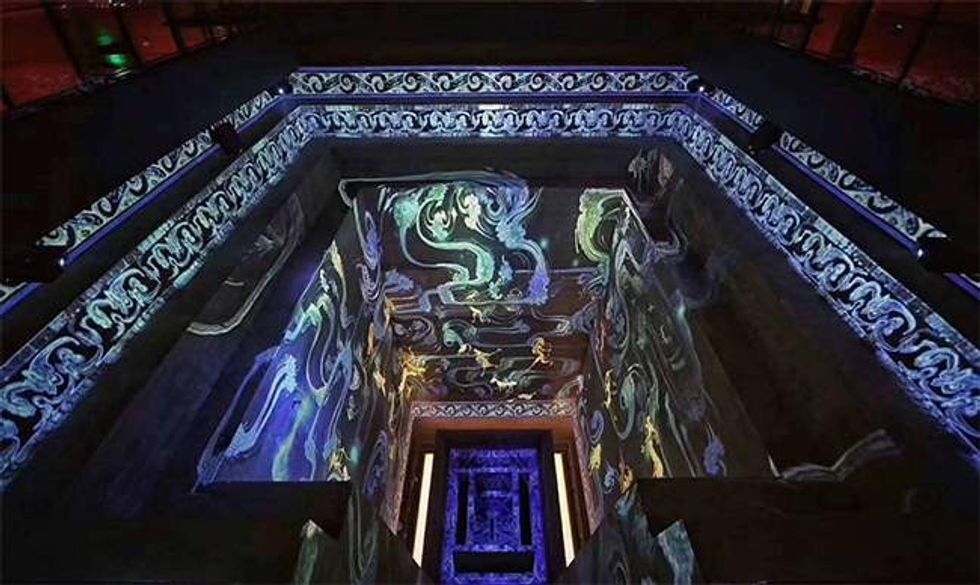 projection on lady dai tomb at hunan museum featuring han dynasty blue dragon