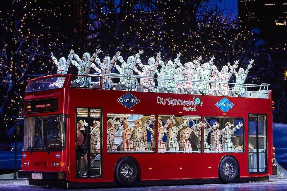radio city rockettes on a red bus madison square garden
