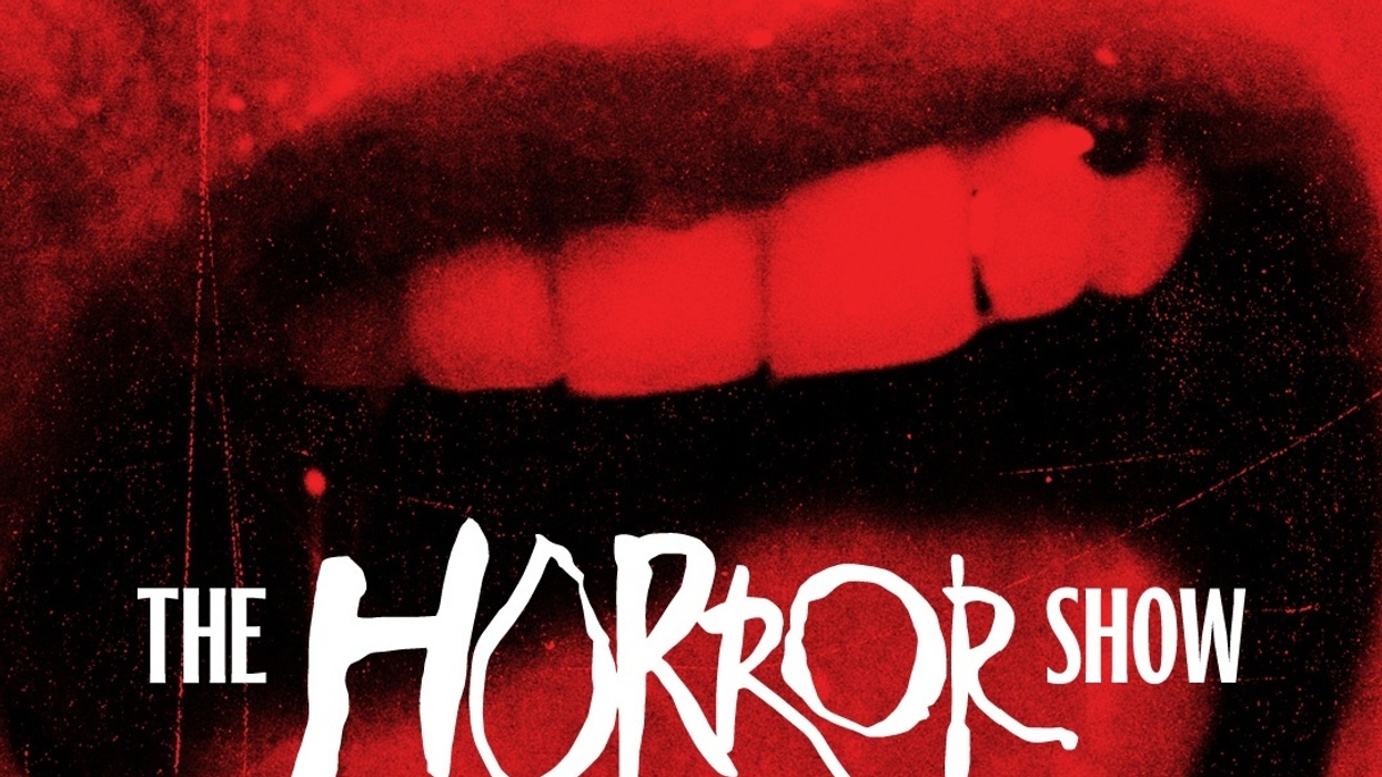 Red-tinted close-up of a mouth with text: "The Horror Show."