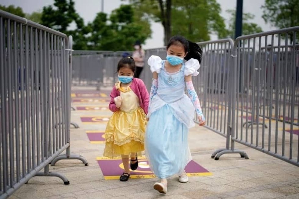 Reduced theme park capacity shanghai disney