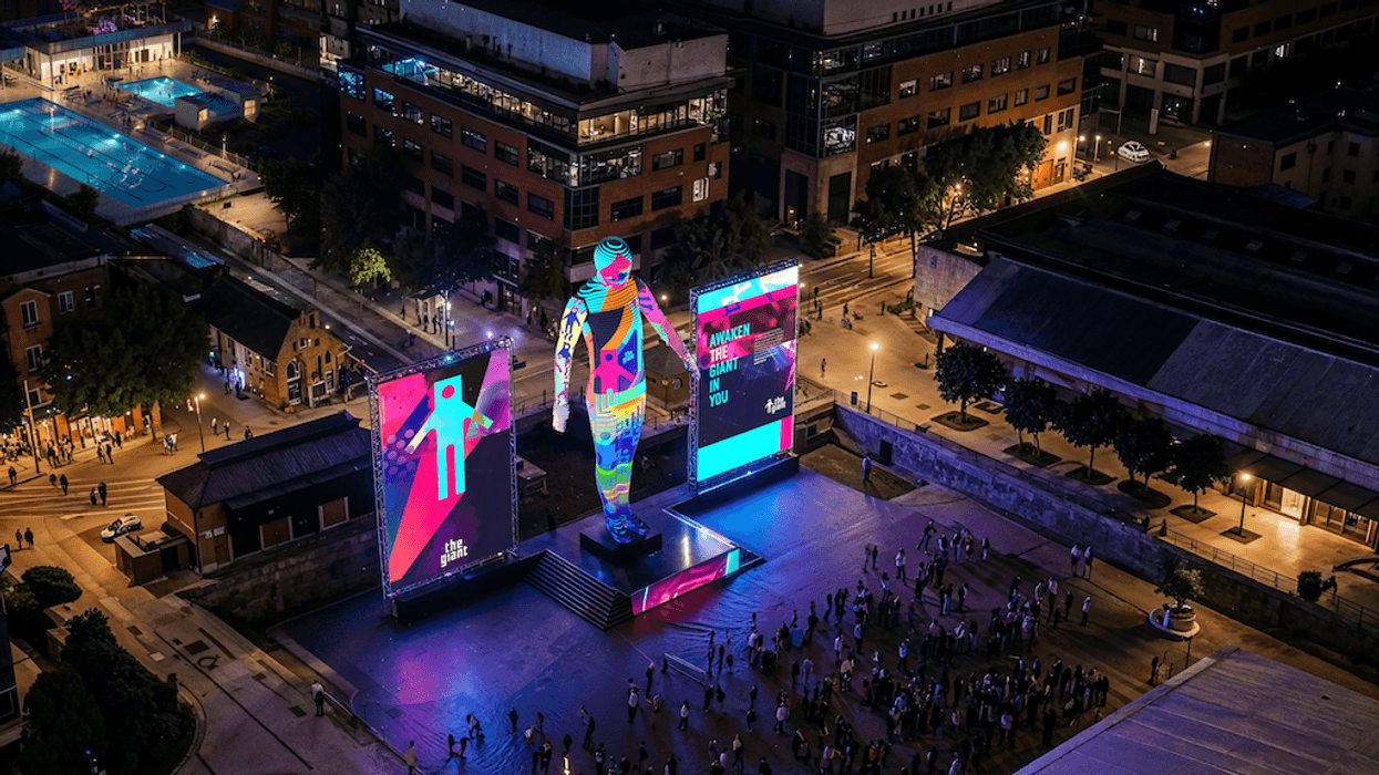 Rendering of crowd gathered around The Giant at Georges Docks, Dublin