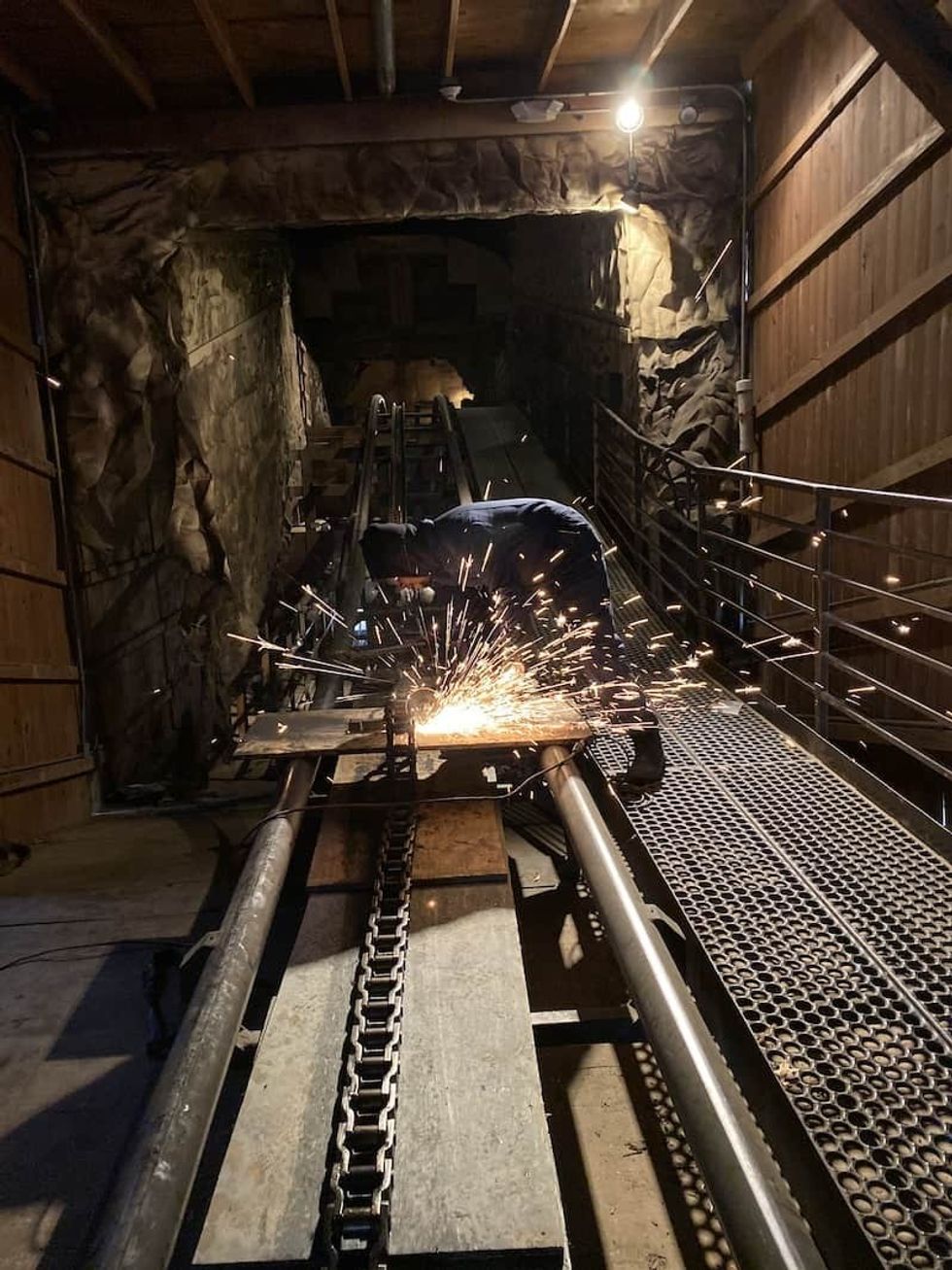 Ride Entertainment replacing the chain on an Arrow Mine Train
