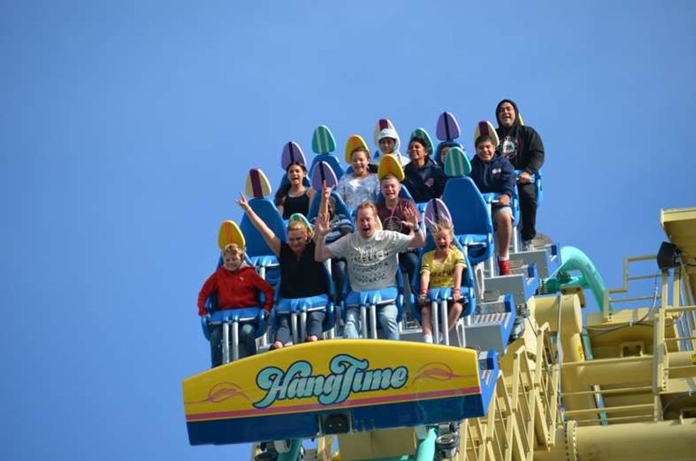 riders on hangtime surf-themed coaster at knotts berry farm