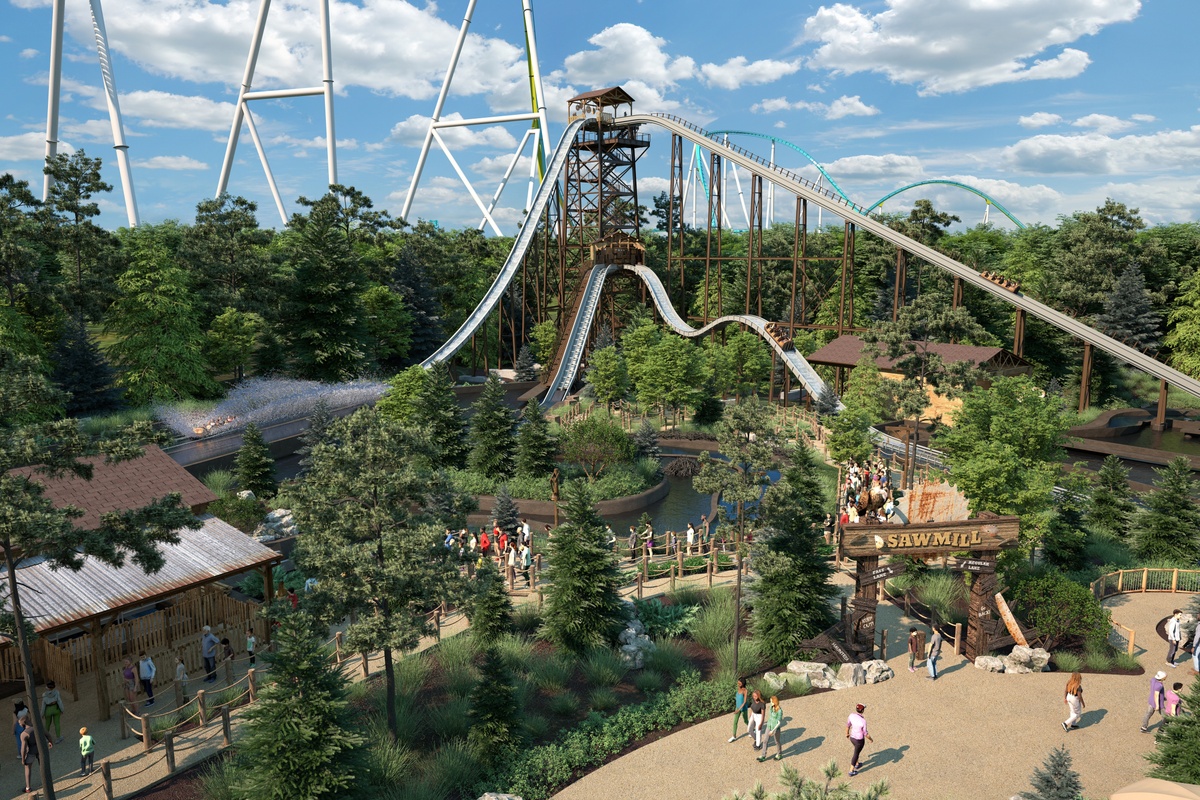 Rip Roarin' Falls Carowinds in a lush, green amusement park with people walking below