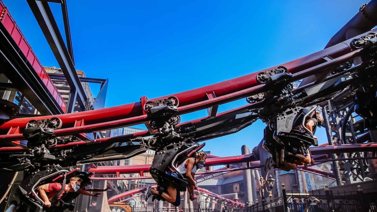 roller coaster riders going uphill