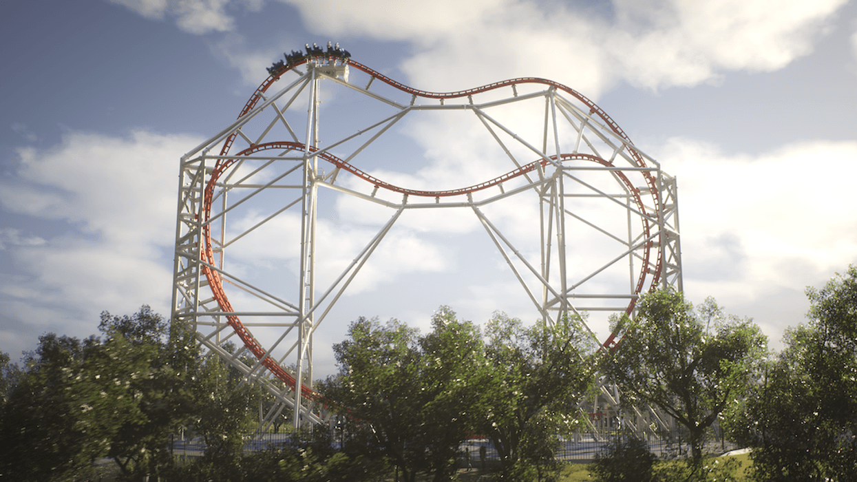 Roller coaster with steep drop and loops against a cloudy sky, surrounded by trees.