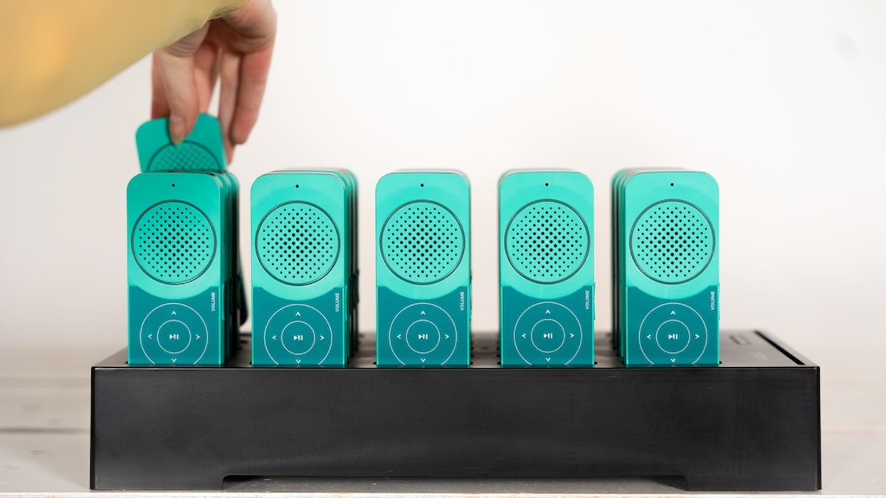 Row of Guide-ID's Podcatcher Pro audio tour devices