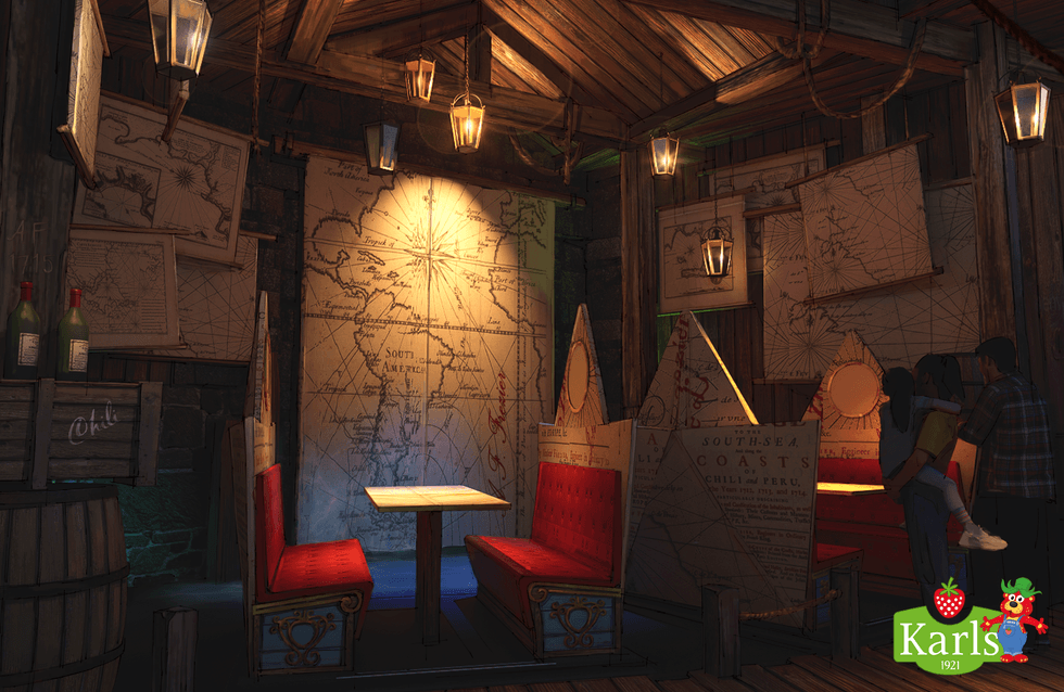 Rustic dark ride room with red booths, nautical maps, and hanging lanterns.