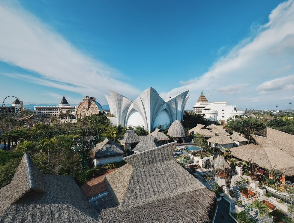 Scenic view of cultural park called VidantaWorld BON with unique modern architecture and thatched-roof structures