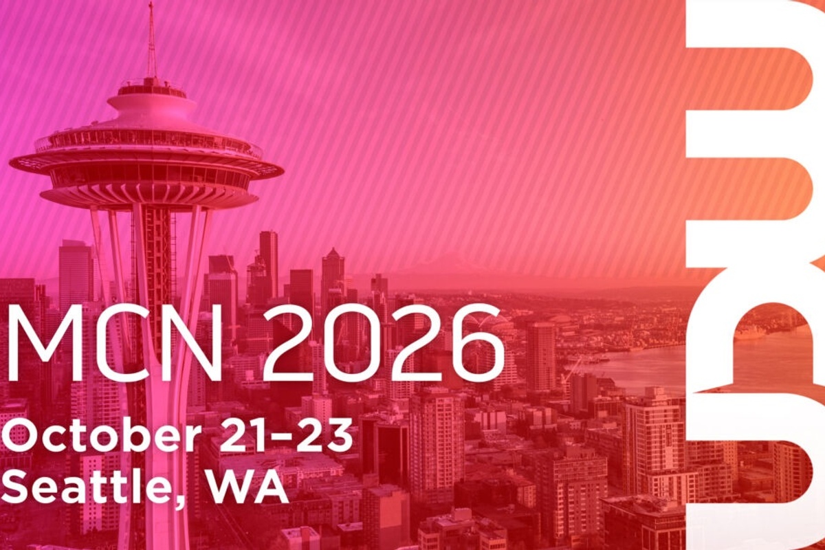 Seattle skyline with MCN 2026 event details, October 21-23.
