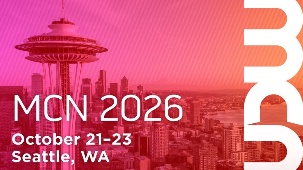Seattle skyline with MCN 2026 event details, October 21-23.